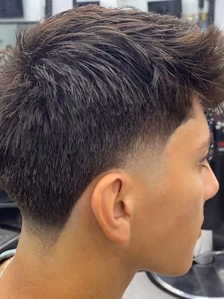 Textured Brush Up Crop & Low Temple Taper - Forward textured crop transitioning into a lifted front fringe with razor-clean temple taper.